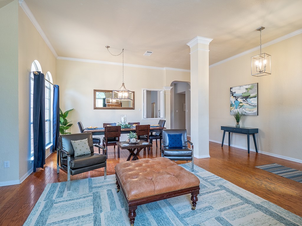 8007 Isaac Pryor Drive Austin, TX 78749 - Photo 4 of 38 a living room with furniture and wooden floor