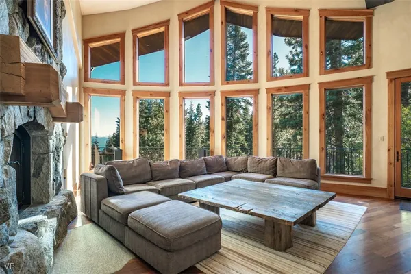 a spacious bedroom with a bed and a couch
