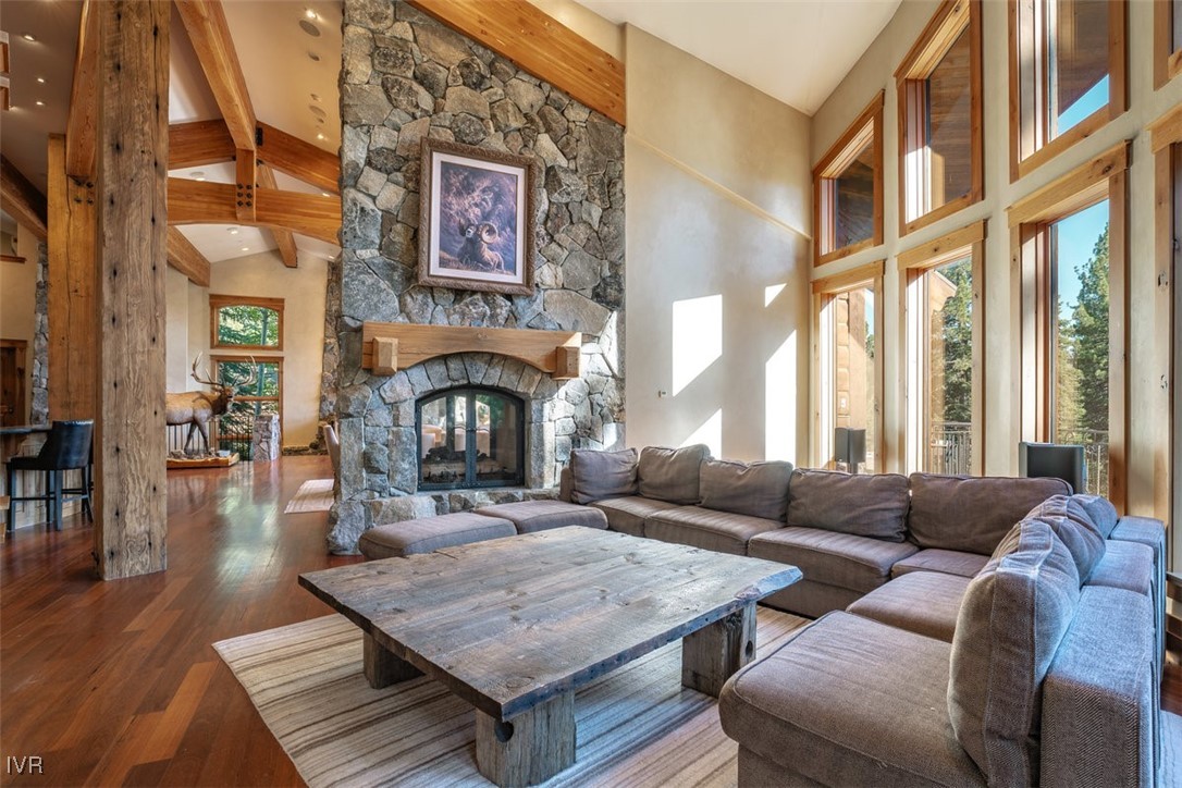 951 Divot Court Incline Village, NV 89451 - Photo 18 of 50 a living room with furniture a fireplace and large windows