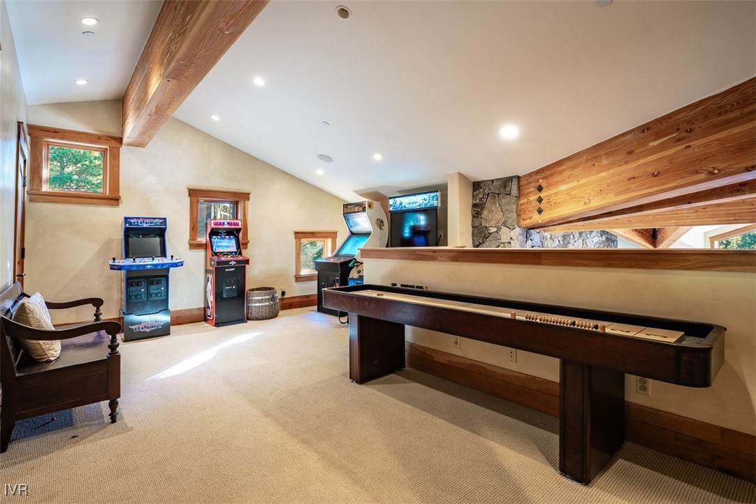 951 Divot Court Incline Village, NV 89451 - Photo 39 of 50 a living room with furniture a flat screen tv and a table