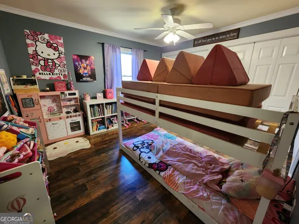 a living room with lots of furniture and a rug