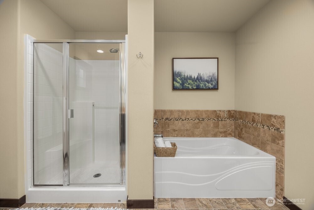 424 Barry Loop Mount Vernon, WA 98274 - Photo 16 of 23 a bathroom with a bathtub and shower