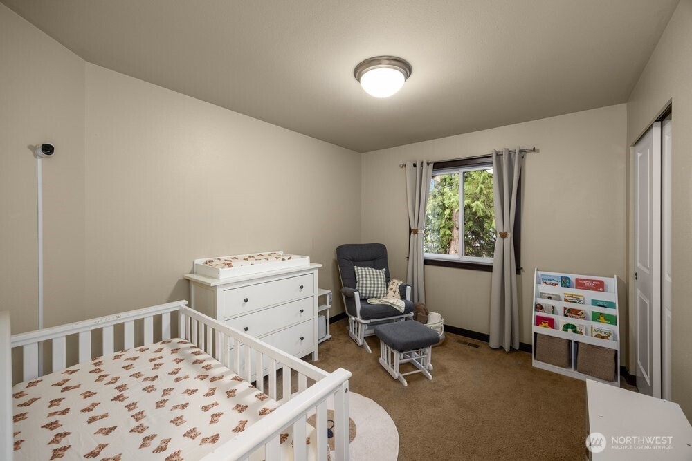 424 Barry Loop Mount Vernon, WA 98274 - Photo 18 of 23 a bedroom with furniture a bed and a window