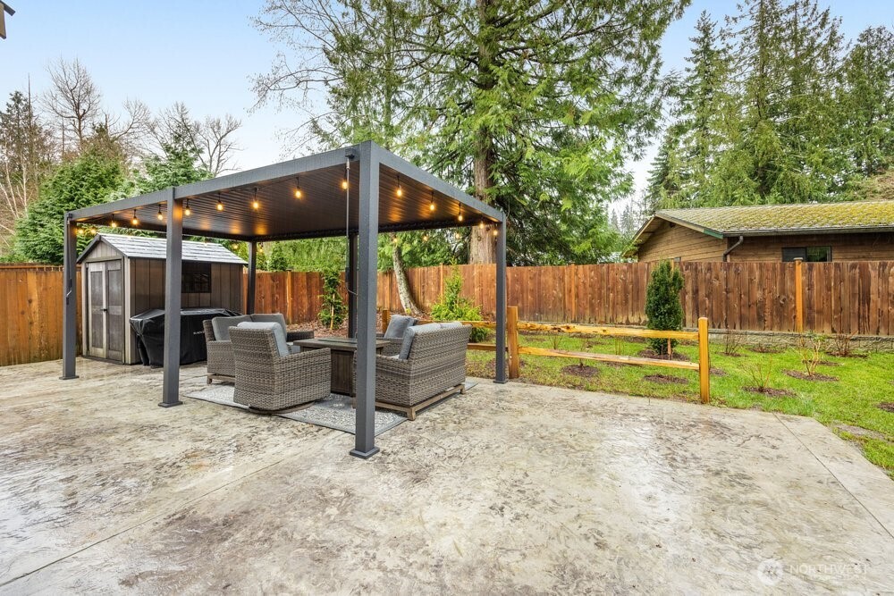 424 Barry Loop Mount Vernon, WA 98274 - Photo 9 of 23 a view of backyard with deck and garden