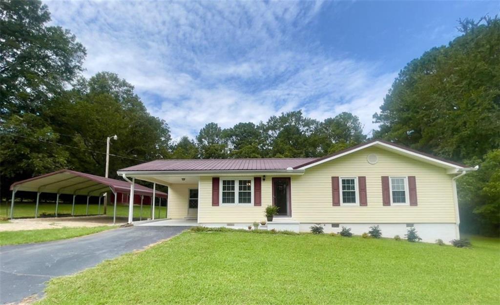 3100 Tommy Dillard Road Monroe, GA 30656 - Photo 1 of 1 a view of a house with a yard