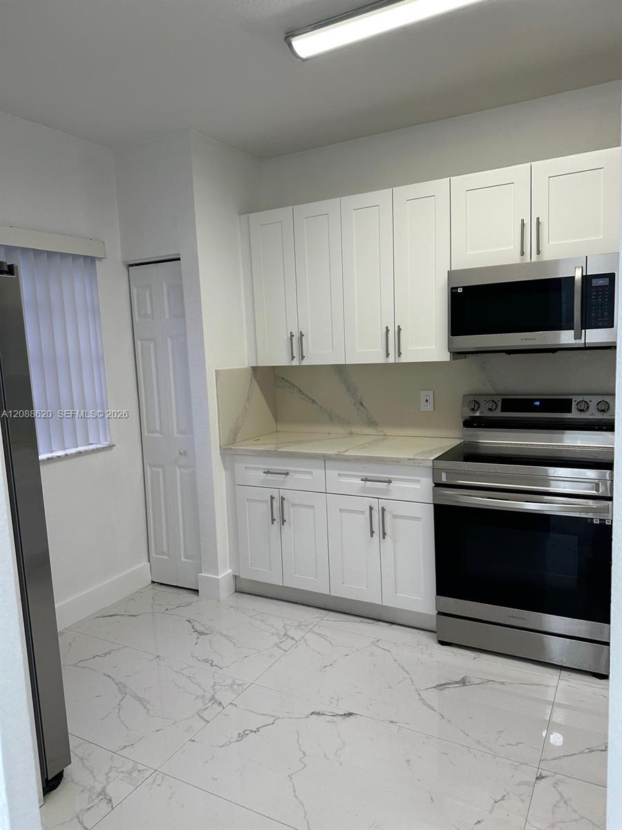 5937 Riverside Avenue Tamarac, FL 33321 - Photo 4 of 23 Gallery Image 4