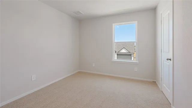 a bathroom with a sink toilet vanity and shower