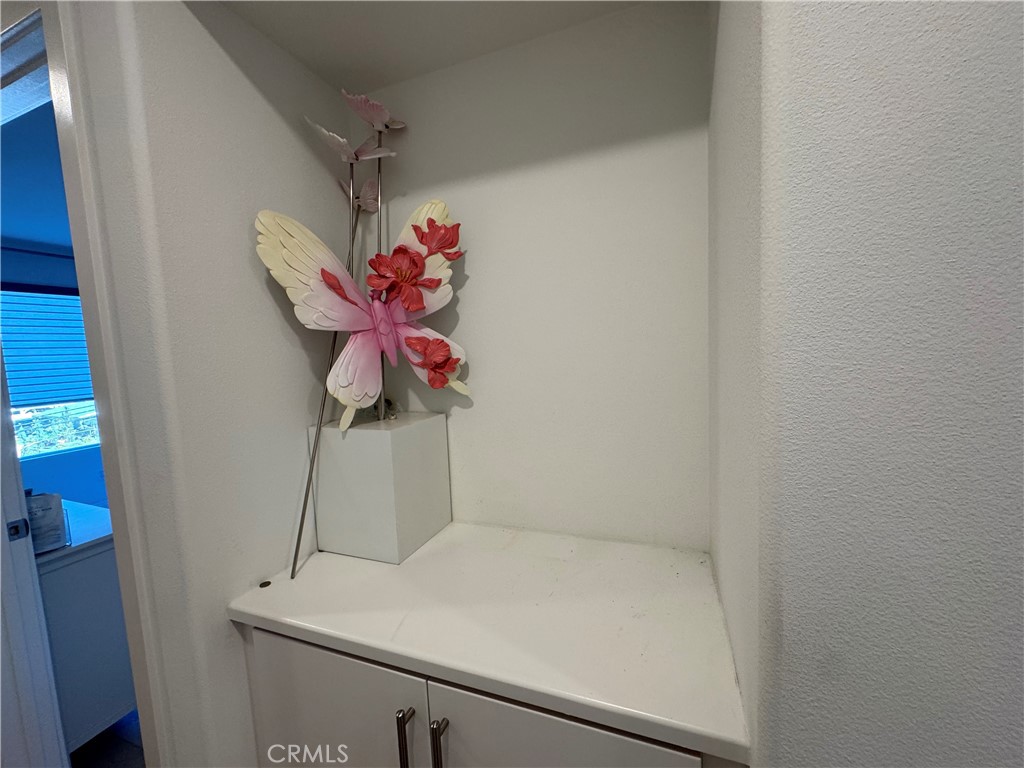 18632 Rorimer Street La Puente, CA 91744 - Photo 15 of 30 a vase of flowers sitting on a shelf