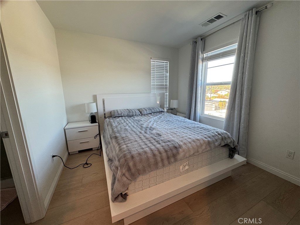 18632 Rorimer Street La Puente, CA 91744 - Photo 20 of 30 a bedroom with a bed and a window