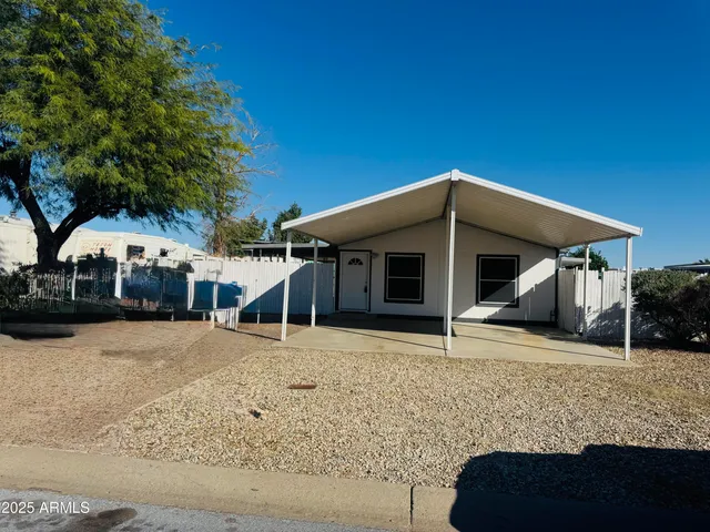 a house with trees in front of it