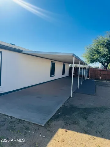 a view of outdoor space with deck and yard