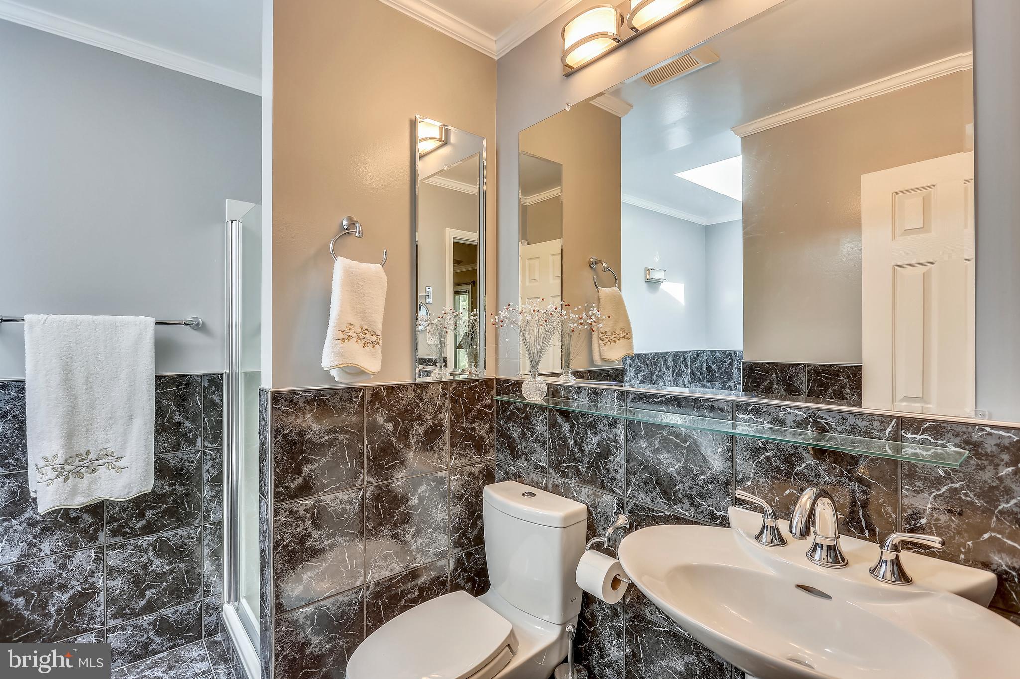 1956 Dundee Road Rockville, MD 20850 - Photo 19 of 34 renovated bath with soaking tub & separate shower