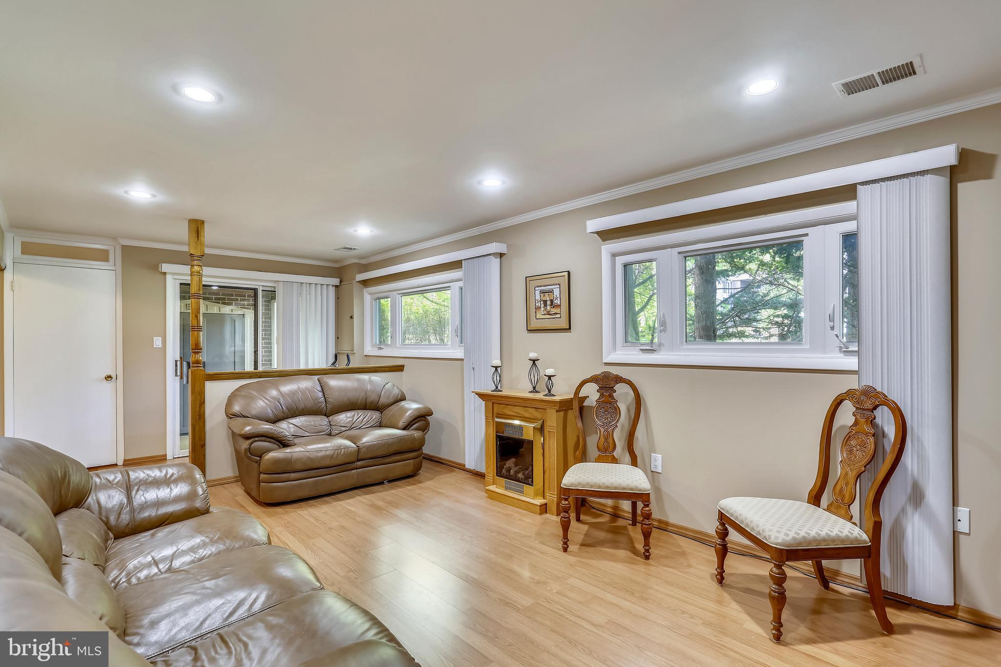 1956 Dundee Road Rockville, MD 20850 - Photo 27 of 34 family room opens to patio
