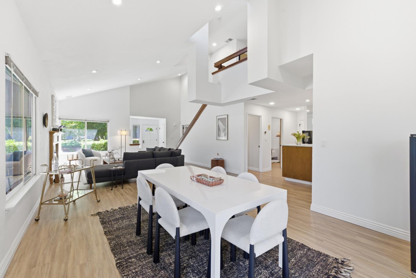 1669 Geary Road Walnut Creek, CA 94597 - Photo 7 of 39 a view of a dining room with furniture and wooden floor