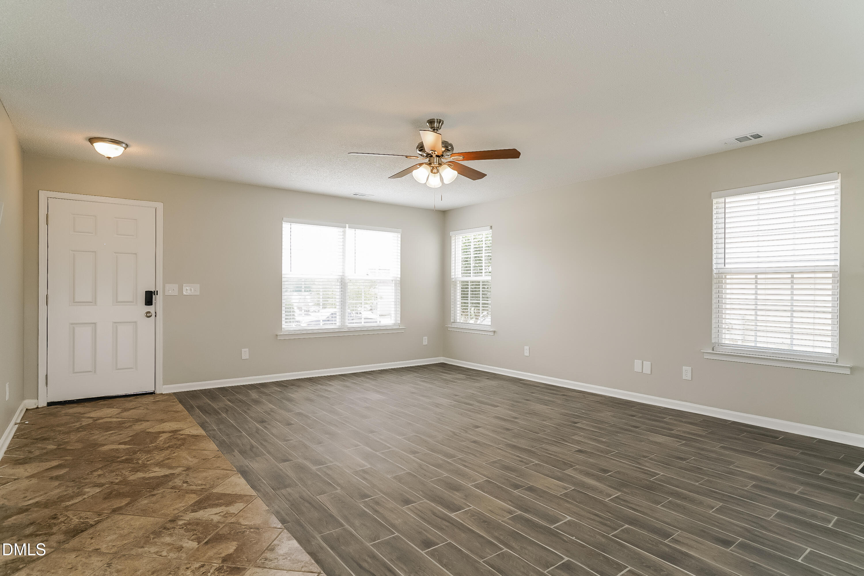 5924 Roteny Court Raleigh, NC 27610 - Photo 3 of 17 a view of an empty room with a window