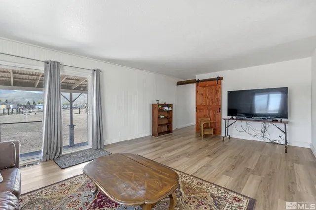 a kitchen with stainless steel appliances a sink stove and refrigerator