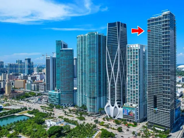 a view of a lake in middle of the town