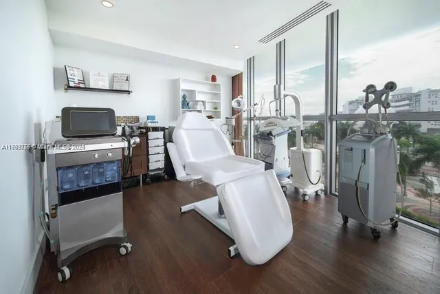 a view of a livingroom with furniture and a table