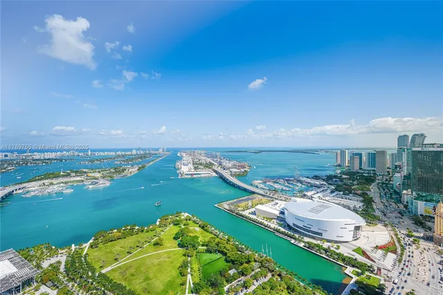 a lobby with furniture and floor to ceiling window