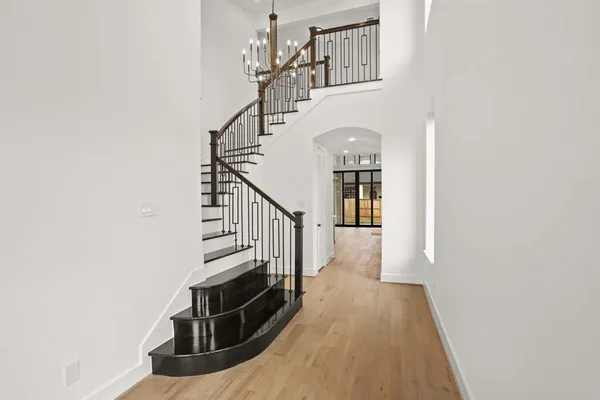 a view of a hallway with windows