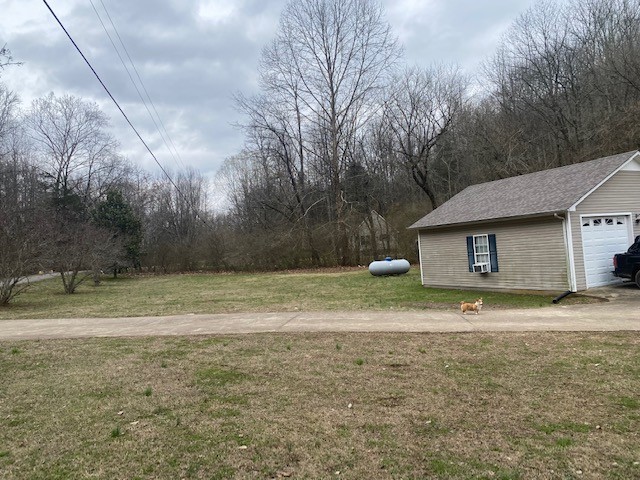 245 Loyd Road Pulaski, TN 38478 - Photo 15 of 20 a view of a yard with a house