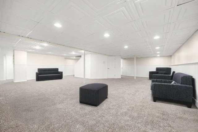 a living room with furniture and a couch