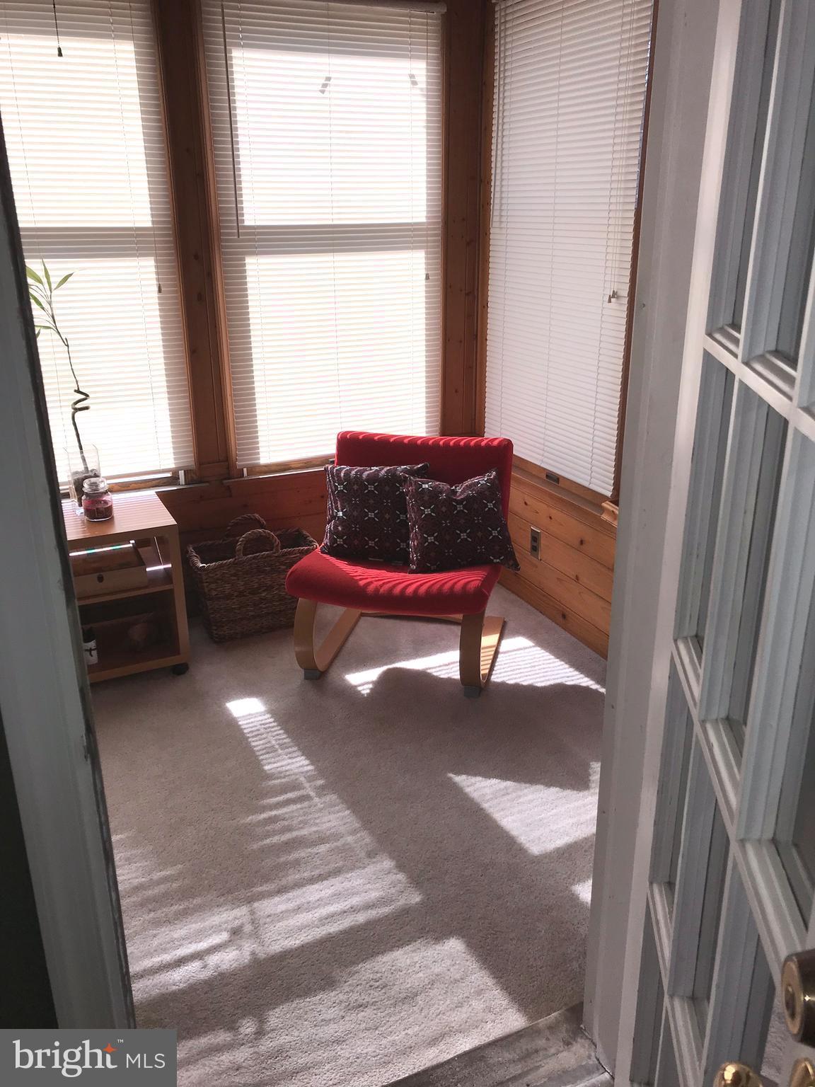 1714 Ranch Lane Baltimore, MD 21222 - Photo 3 of 22 a living room with furniture and a window
