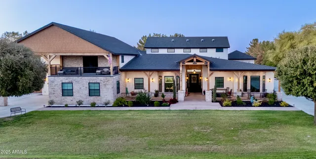 a front view of a house with garage