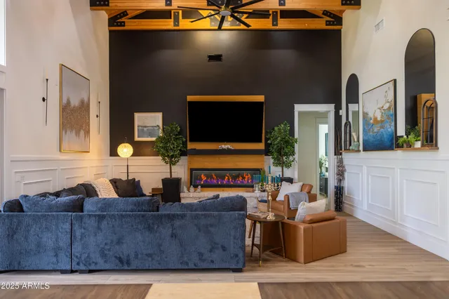 a living room with furniture and a window