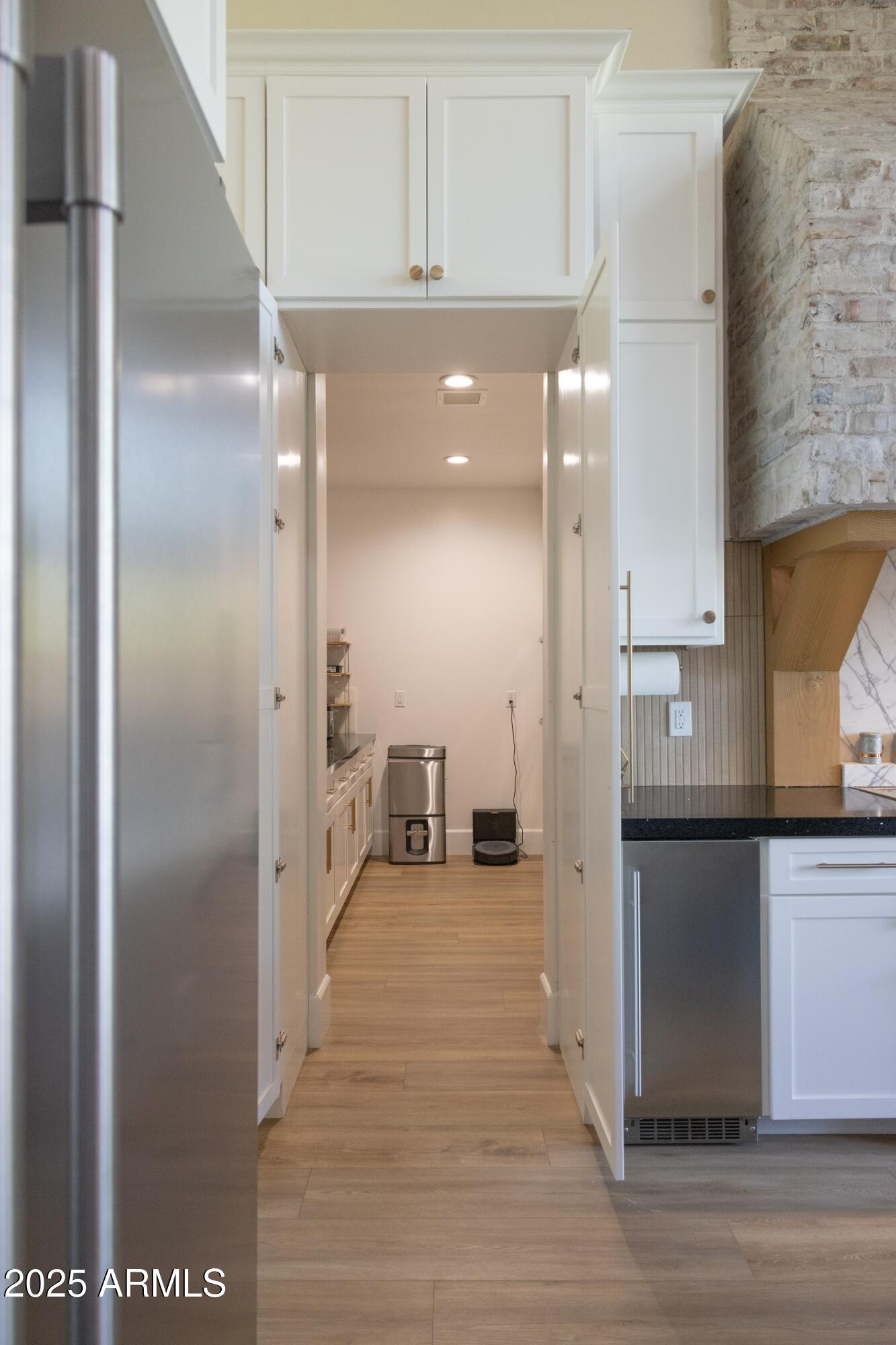 16322 East Fairview Street Gilbert, AZ 85295 - Photo 22 of 115 a view of a hallway with wooden floor