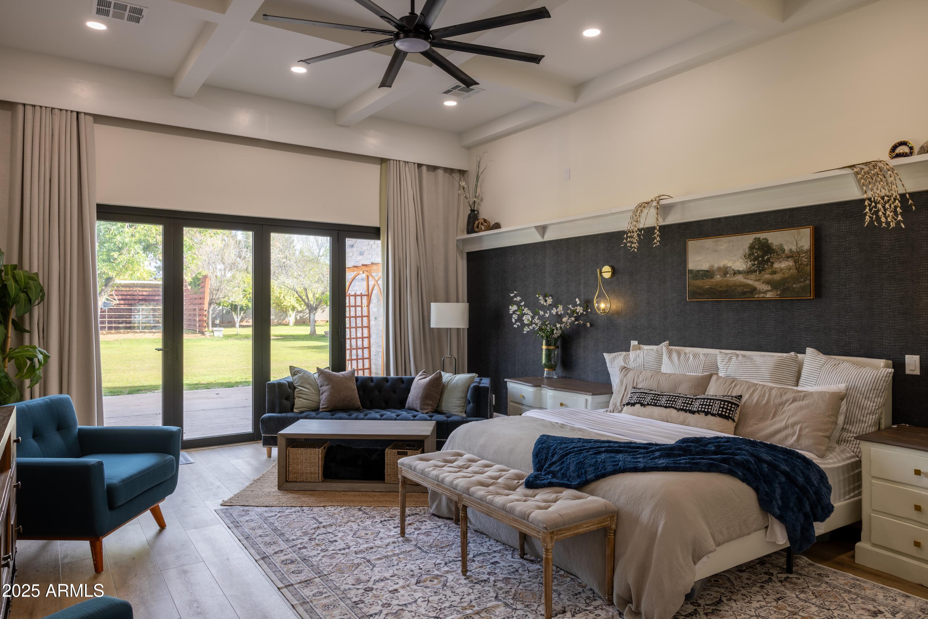 16322 East Fairview Street Gilbert, AZ 85295 - Photo 26 of 115 a bedroom with a large bed and a couch