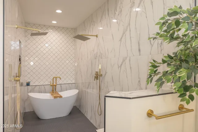 a kitchen with a table chairs and flat screen tv