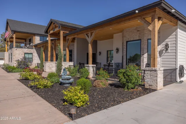 a view of an outdoor dining space with a patio