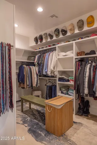 a bathroom with a sink a vanity and a mirror