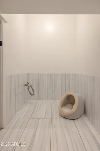 a view of a livingroom with furniture and a fireplace