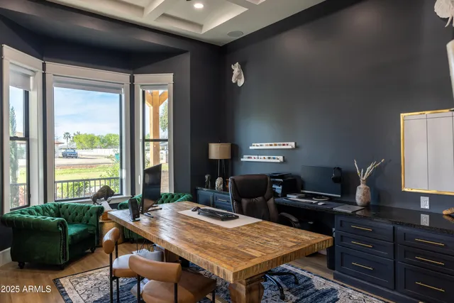 a front view of a house with outdoor seating