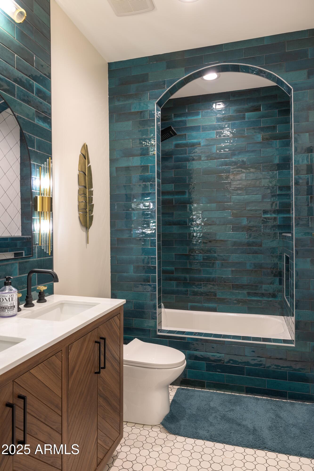 16322 East Fairview Street Gilbert, AZ 85295 - Photo 39 of 115 a bathroom with a sink toilet and shower