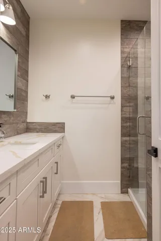a bathroom with a toilet and a sink