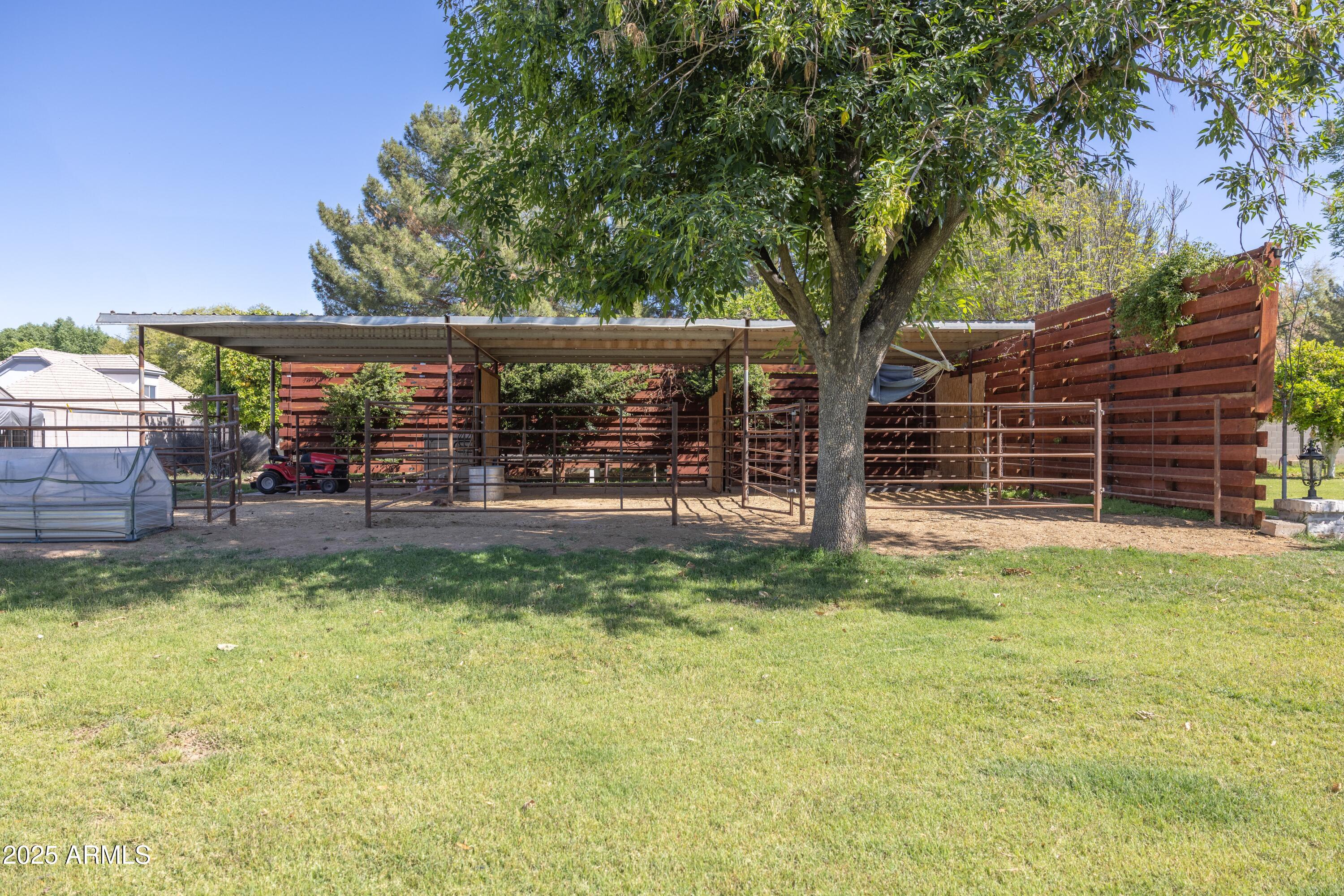 16322 East Fairview Street Gilbert, AZ 85295 - Photo 96 of 115 a view of outdoor space with deck and a garden