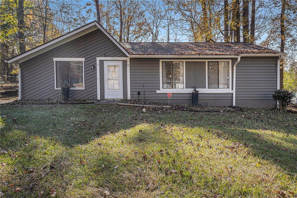 190 Kipling Way Riverdale, GA 30274 - Photo 1 of 22 a front view of a house with a yard