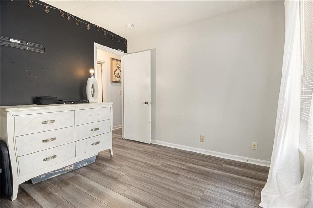 190 Kipling Way Riverdale, GA 30274 - Photo 16 of 22 a room with a dresser and a mirror