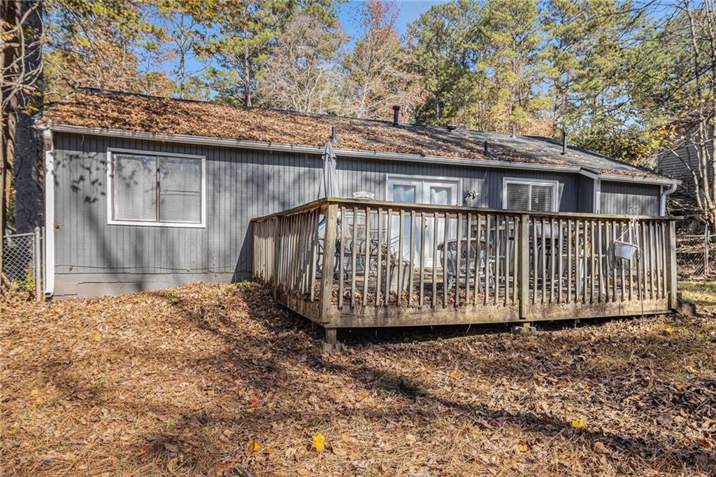 190 Kipling Way Riverdale, GA 30274 - Photo 19 of 22 a view of a house with a wooden fence