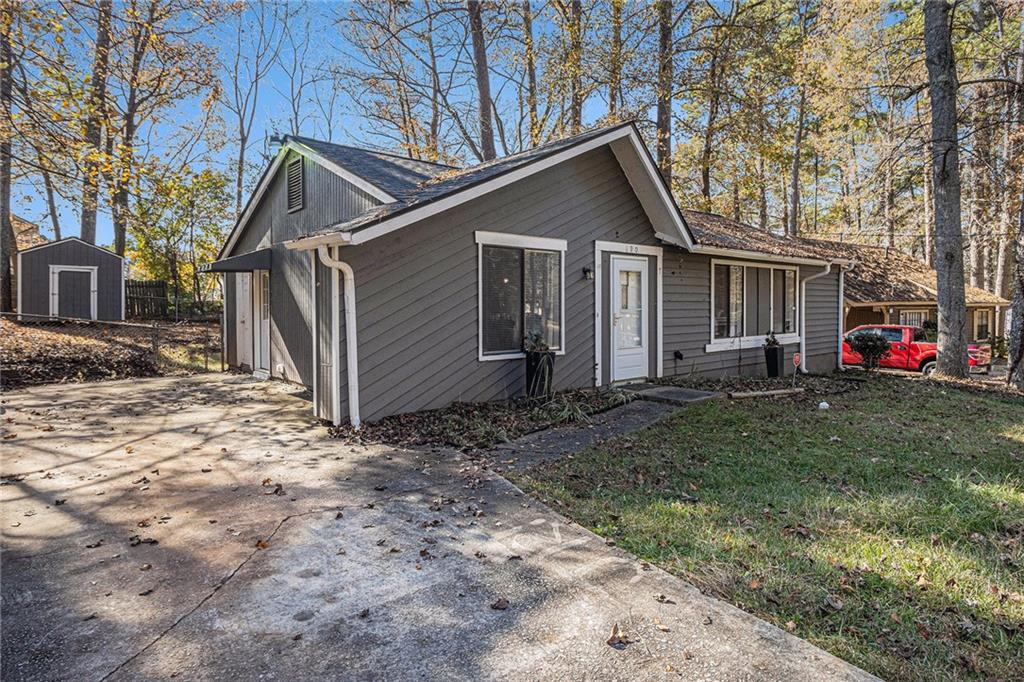 190 Kipling Way Riverdale, GA 30274 - Photo 2 of 22 a view of a yard with a house and a yard