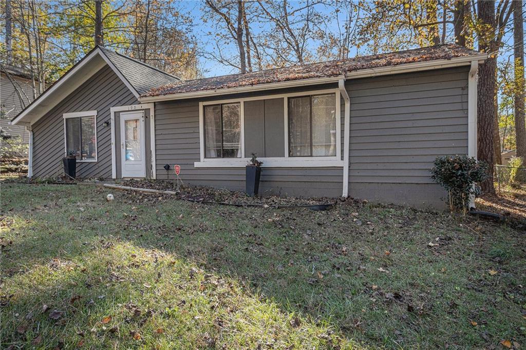 190 Kipling Way Riverdale, GA 30274 - Photo 3 of 22 a front view of a house with garden