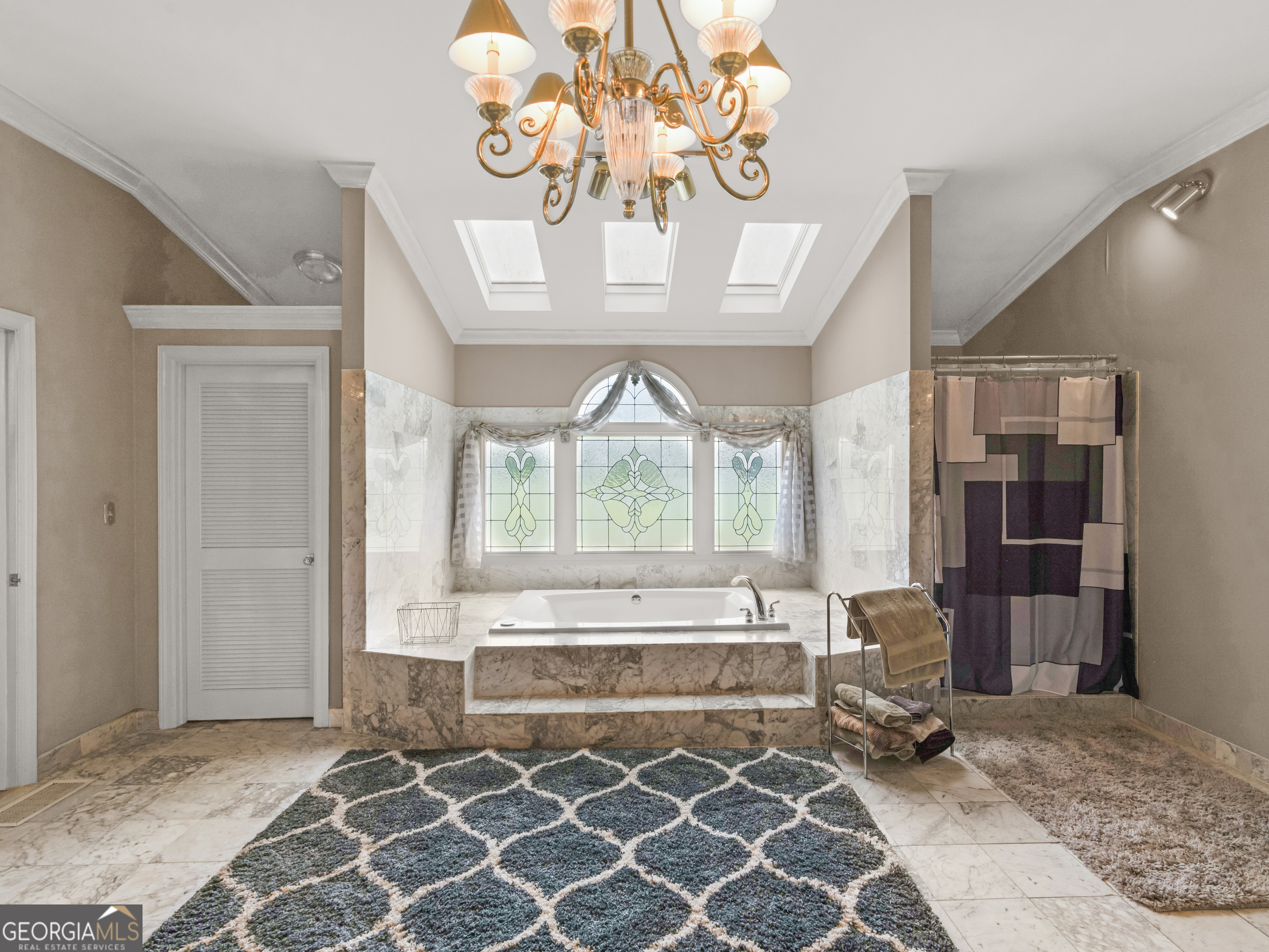 474 North Rover Road Williamson, GA 30292 - Photo 31 of 89 a living room with a large window and chandelier