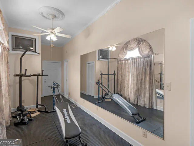 a bedroom with a bed and furniture