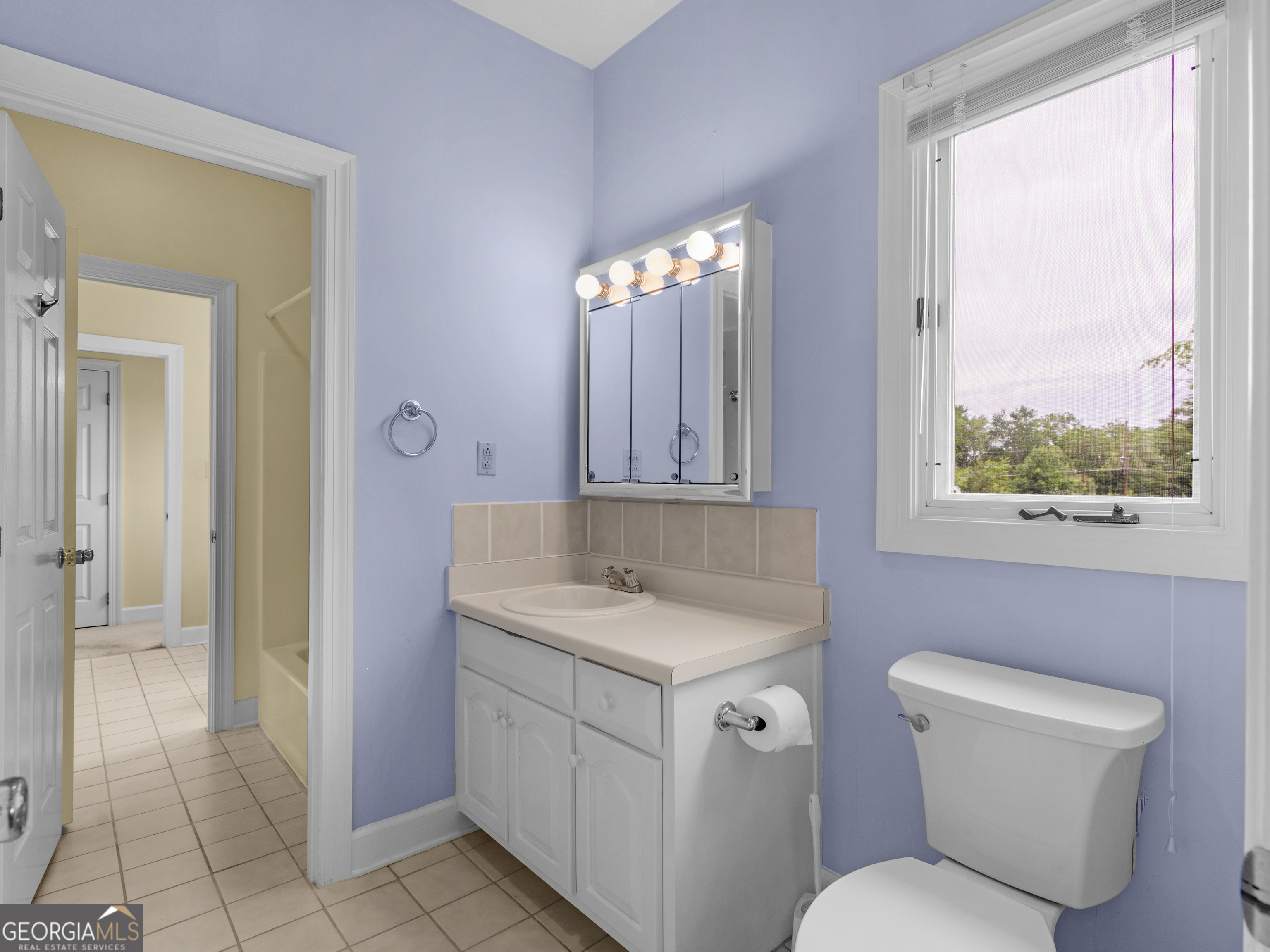 474 North Rover Road Williamson, GA 30292 - Photo 59 of 89 a bathroom with a toilet sink and mirror