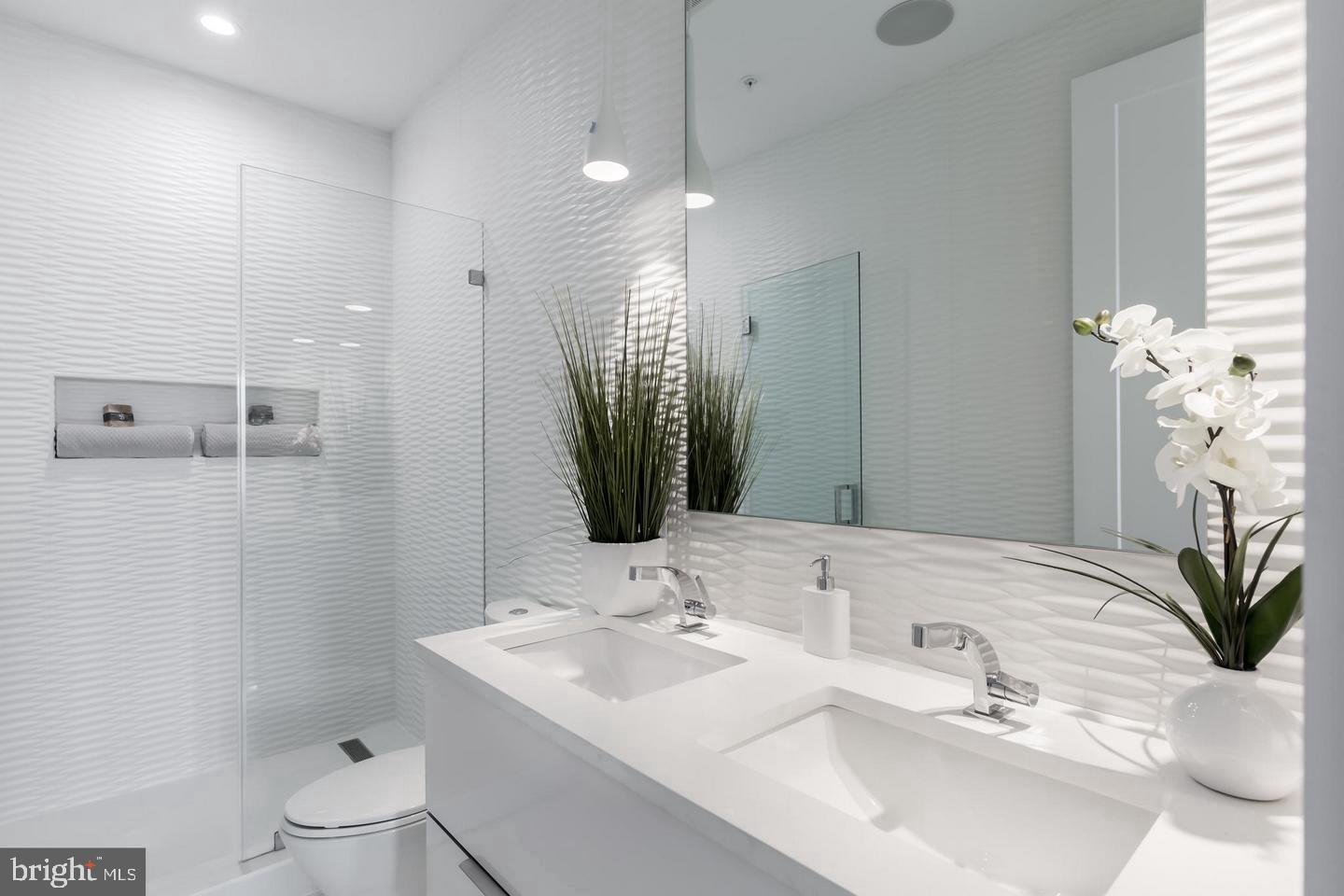 3527 14th Street Northwest, Unit 3 Washington, DC 20010 - Photo 10 of 12 a bathroom with a sink a toilet and shower