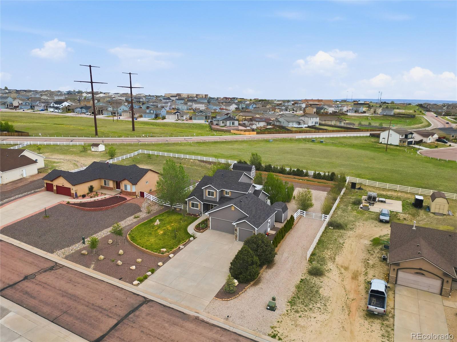 9288 Rockingham Drive Peyton, CO 80831 - Photo 40 of 49 a view of a city with an ocean