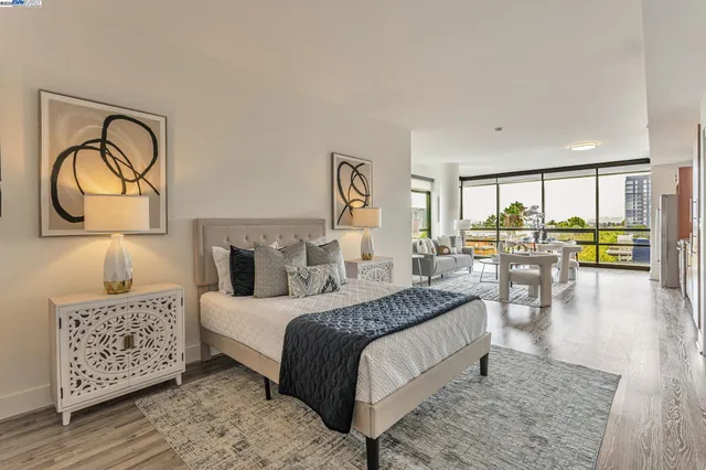 a bedroom with a large bed and a table